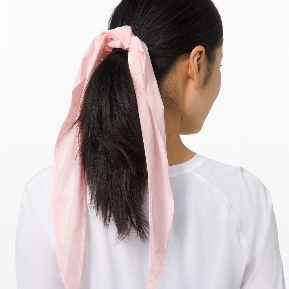 2 Lululemon uplifting scrunching teal and pink